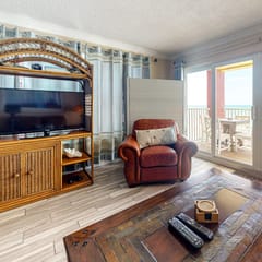 Beachfront condo with heated pool hot tub balcony and grill