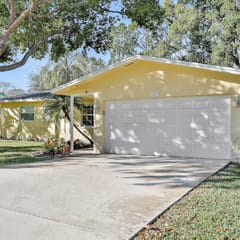 Stunning centrally located home with enclosed yard patio grill WD and AC