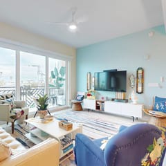 Sunlit and colorful beach condo with heated pool hot tub and balcony near shore and shops