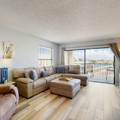 Newly renovated condo w private balcony gas grill and on site heated pool AC