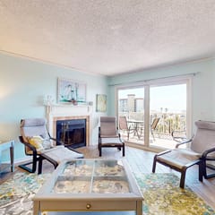 Seashore getaway with partial Gulf view and beachfront heated pool and spa