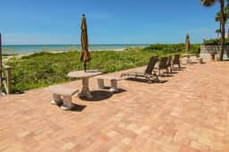Elegant 1st floor condo w private patio AC on site outdoor pool and gas grills