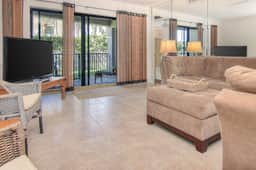 Elegant 1st floor condo w private patio AC on site outdoor pool and gas grills