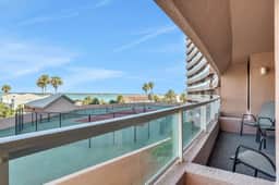 Vibrant ocean view condo with hot tub tennis court pool WD balcony and grill