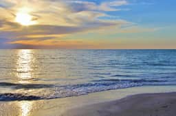 Pristine condo with sweeping Gulf views pool sauna and tennis