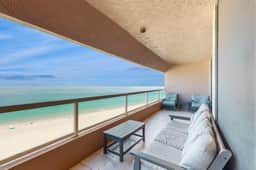 12th floor beachfront condo with balcony heated pool gym pool spa and tennis