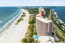 12th floor beachfront condo with balcony heated pool gym pool spa and tennis