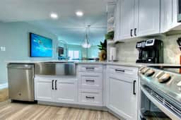 4th floor beachfront condo with private balcony views pool BBQ and AC