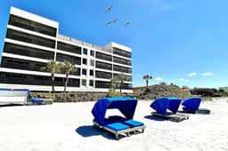 Extraordinary Gulf front condo w screened in balcony WD AC heated pool pool spa
