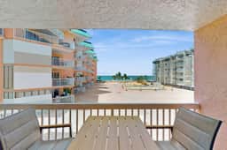 Seaside bliss with scenic Gulf view balcony and beachfront heated pool and spa