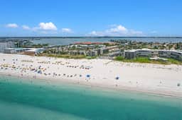 Contemporary gem on the Gulf Coast with balcony and WD walk to beach and shops