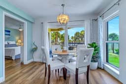 Contemporary gem on the Gulf Coast with balcony and WD walk to beach and shops
