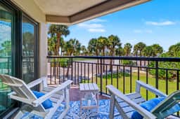 Contemporary gem on the Gulf Coast with balcony and WD walk to beach and shops