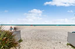 Beachfront condo with amazing Gulf views pool hot tub grills balcony and WiFi