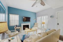 Water view condo with balcony grill heated pool hot tub and sauna walk to beach