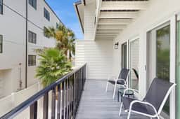 Family and dog friendly steps to the Gulf and beaches shared putting green AC