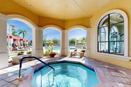 Snowbird friendly condo with pool hot tub sauna fitness room and on site tennis
