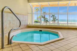 Luxe penthouse with balcony sweeping views heated pool spa hot tub and gym