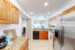 Coastal condo with beach and pool access balcony WD central air and water views