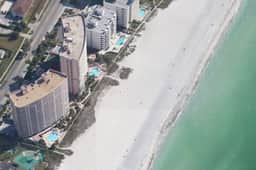 Beachfront condo with great views balcony heated pool sauna and hot tub