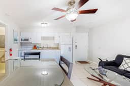 Centrally located condo with heated pool balcony washer dryer and central AC