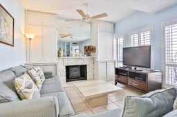 Water view condo with balcony heated pool and WD walk to beach