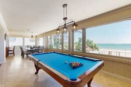 Beachfront penthouse with pool great views and pool table