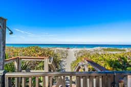 Gorgeous updated and spacious condo with stunning beachfront view pool WD and AC