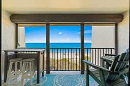 Gorgeous updated and spacious condo with stunning beachfront view pool WD and AC