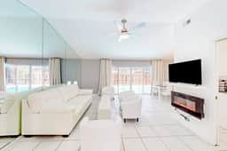 Coastal home with pool lanai patio and fireplace