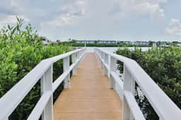 Gulf side condo with heated pool hot tub central AC and WD snowbird friendly