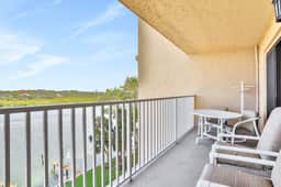 Elegant condo with water view near beach pool and hot tub fast WiFi and AC