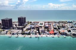 Treasure Island paradise with pool and Gulf view deck steps to Sunset Beach