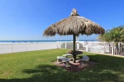 Upscale beachfront condo with dual balconies Gulf view pool hot tub and bocce