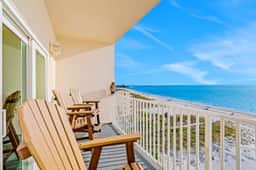 Top floor beachfront condo with Gulf views balcony pool hot tub and bocce