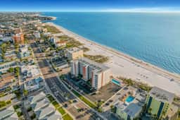 Top floor beachfront condo with Gulf views balcony pool hot tub and bocce