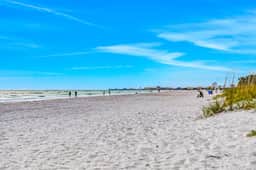 Charming Gulf front condo w/ balcony full kitchen central AC and WD