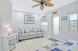 Beachfront studio with grilling area and shuffleboard steps to sand