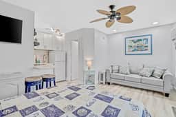 Beachfront studio with grilling area and shuffleboard steps to sand