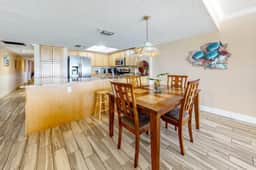 Beachfront condo with heated pool hot tub balcony and grill
