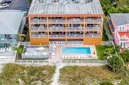 Beautiful oceanfront condo on the beach with pool and WiFi walk to restaurants