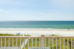 Beautiful oceanfront condo on the beach with pool and WiFi walk to restaurants