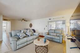 Ground floor getaway with a heated pool and central AC walk to the beach