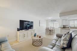 Ground floor getaway with a heated pool and central AC walk to the beach