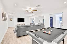 Dog friendly tropical stay with a private pool grill game tables and central AC