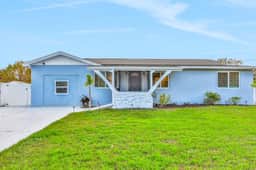 Dog friendly tropical stay with a private pool grill game tables and central AC