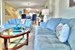 Coastal condo with multiple balconies and dock intracoastal waterway views