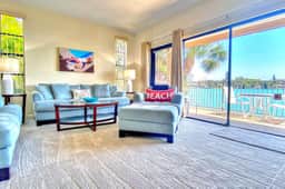 Coastal condo with multiple balconies and dock intracoastal waterway views