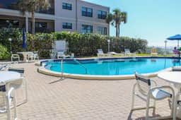 Chic and comfortable Gulf front condo snowbird and dog friendly pool beaches