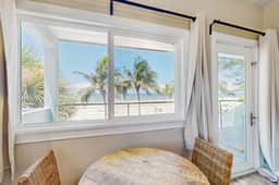 Gulf front condo top floor beach access full kitchen and central AC